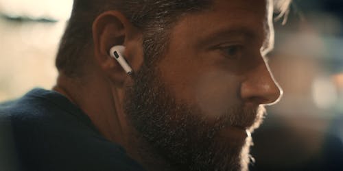 Man wearing Air Pods Man wearing Air Pods