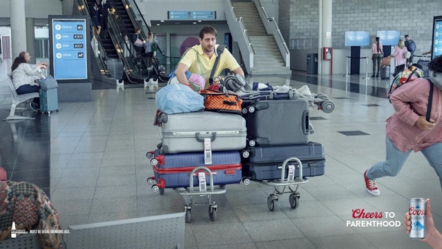 Man in an airport with luggage