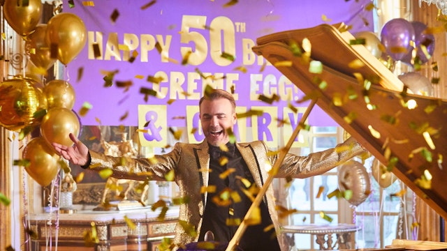 Gary Barlow celebrating Creme Egg 50th birthday