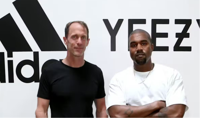 Kanye West pictured with Adidas brand president Eric Liedtke