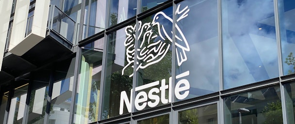 Nestlé logo on the facade of Nestlé France headquarters building near Paris, France