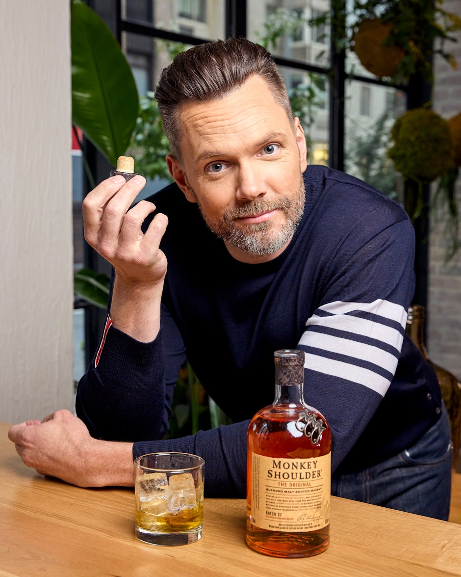 Joel McHale with whisky