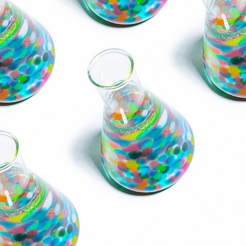 Conical flasks with colorful contents