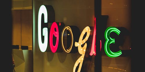 A neon google logo using unfamiliar fonts A neon google logo using unfamiliar fonts