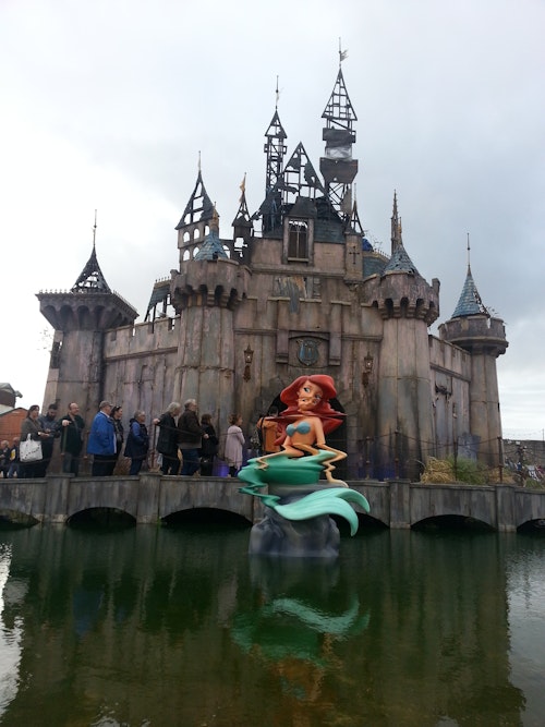 Dismaland Castle by Banksy featuring the Little Mermaid