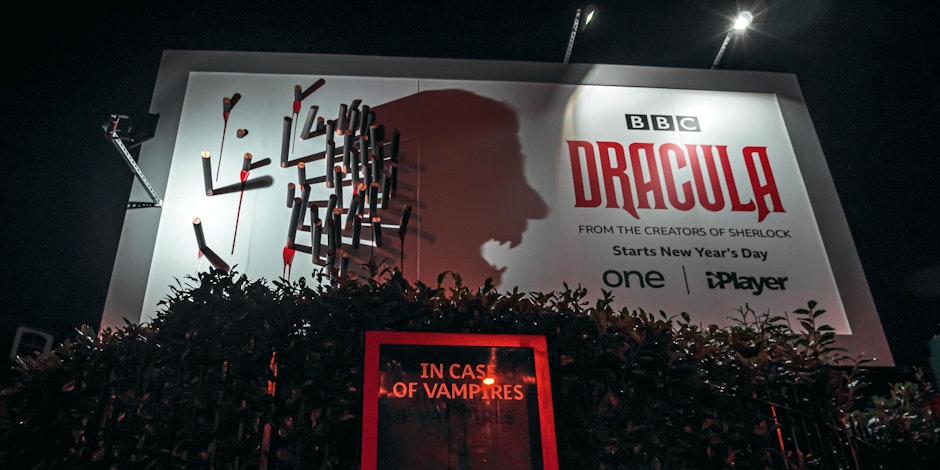 BBC erects immersive Dracula billboards with bloody stakes and haunting shadows