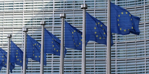 EU flags flutter in a line