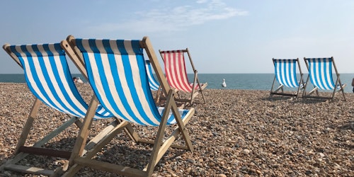 Deck chairs on Brighton beach