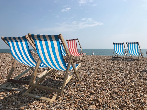 Deck chairs on Brighton beach