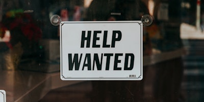 help wanted sign in a window