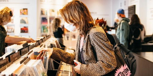 woman browsing records in rough trade nyc