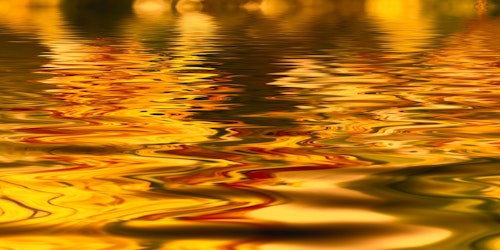 A lake of golden liquid, representing a gold standard or wealth