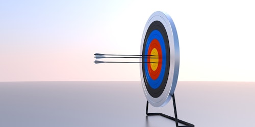 A target board with several arrows sticking out of it