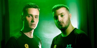 Two esports stars model the Excel kits complete with EE branding