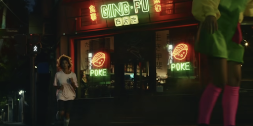 The ad features a woman running alone at night