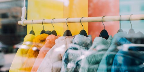 A range of jackets in a shop window, demonstrating the potential for intent-based e-commerce