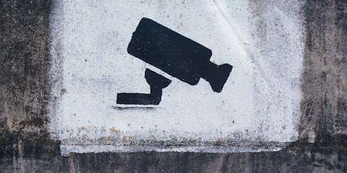 A graffito of a digital security camera. The UK's Online Safety Bill has been called incoherent and unworkable by privacy campaigners