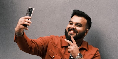 LoveThat looks at the history and evolution of the selfie and considers how marketers can utilize its form. Image credit: Marc Kleen/Unsplash.