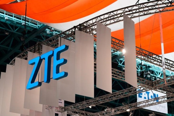 ZTE blue logo branding in an event space