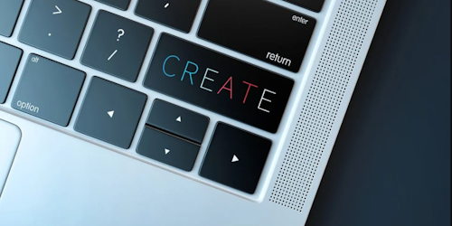 laptop keyboard with the word create on the enter button