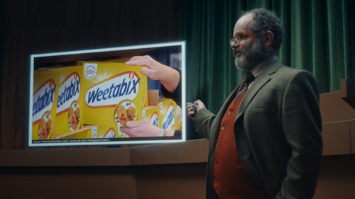 Man with a Weetabix sign 