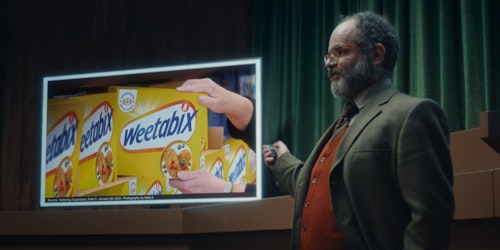 Man with a Weetabix sign 