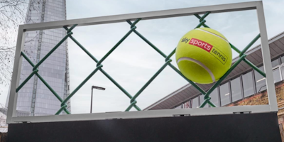 Giant tennis balls on a billboard
