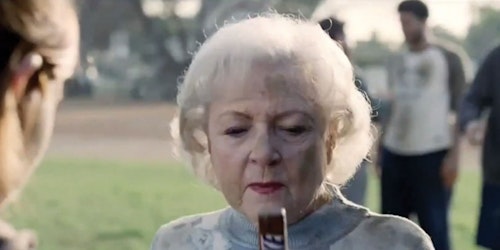 Betty White with a Snickers