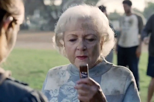 Betty White with a Snickers