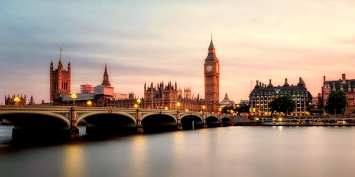 Photograph of a sunrise over Westminster Bridge and Elizabeth Tower