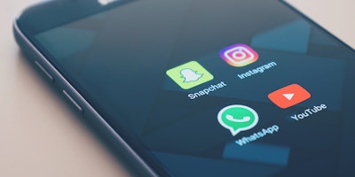 A smartohone screen showing a variety of social media platform icons.