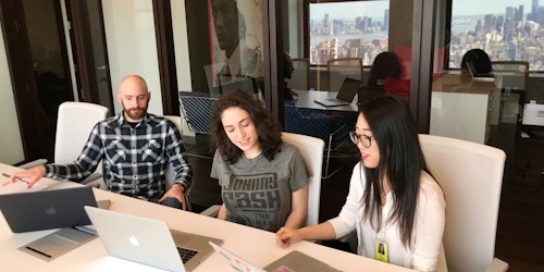 Interns at work in StrawberryFrog's New York office.
