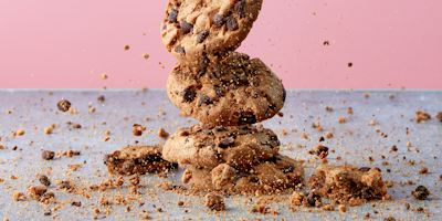 Cookies falling and being crumbled
