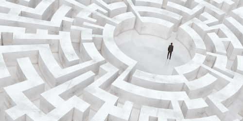 Man standing in center of maze