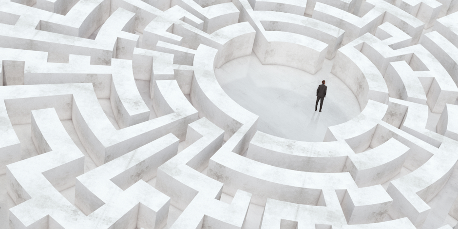 Man standing in center of maze