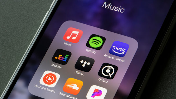 Music apps on mobile phone screen