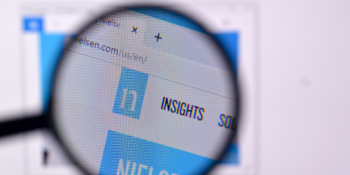 Nielsen site homepage with magnifying glass
