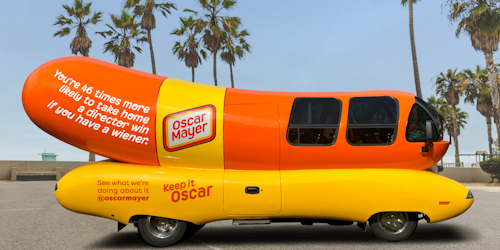 Oscar Mayer Wienermobile with palm trees in the background