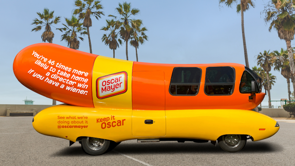 Oscar Mayer Wienermobile with palm trees in the background