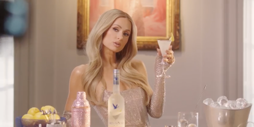 Paris Hilton holding martini