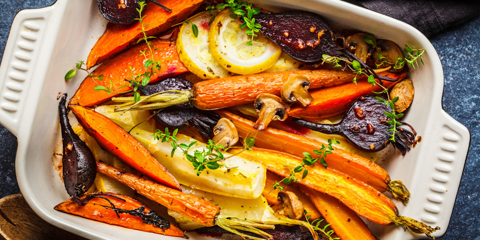 Casserole tray full of fall vegetables and carrots