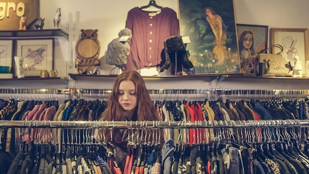 Young girl in thrift shop