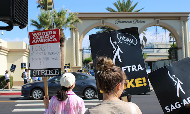 Writers and actors striking outside of Hollywood's Paramount Pictures