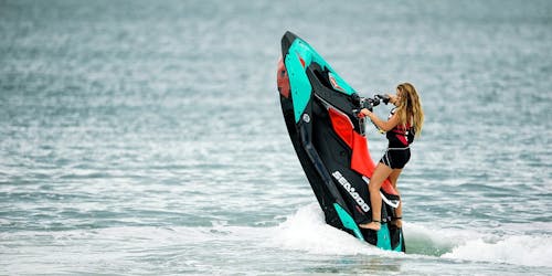 Woman riding See-Do (jet ski) Woman riding See-Do (jet ski)