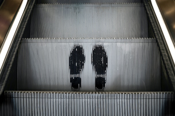 Footprints on an escalator