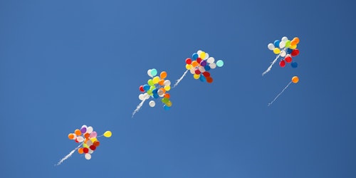 Some balloons, floating free