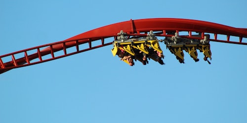 A rollercoaster, in corkscrew, currently upside-down