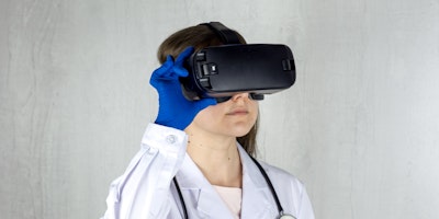 A doctor wearing a virtual reality headset