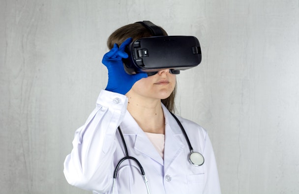 A doctor wearing a virtual reality headset