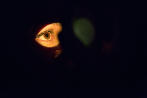 An eye, in a shaft of light